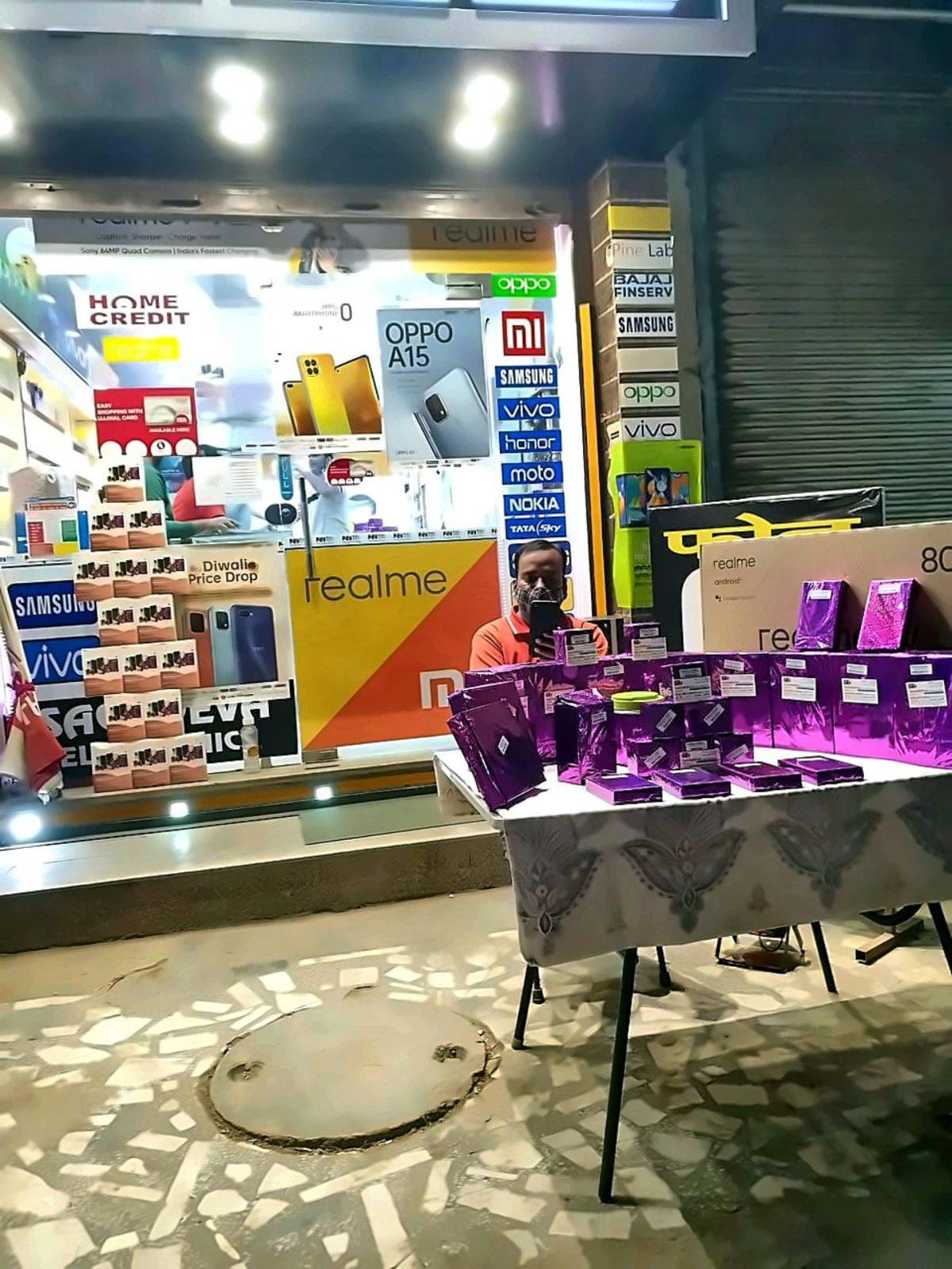 Sachdeva Electronics product display at night